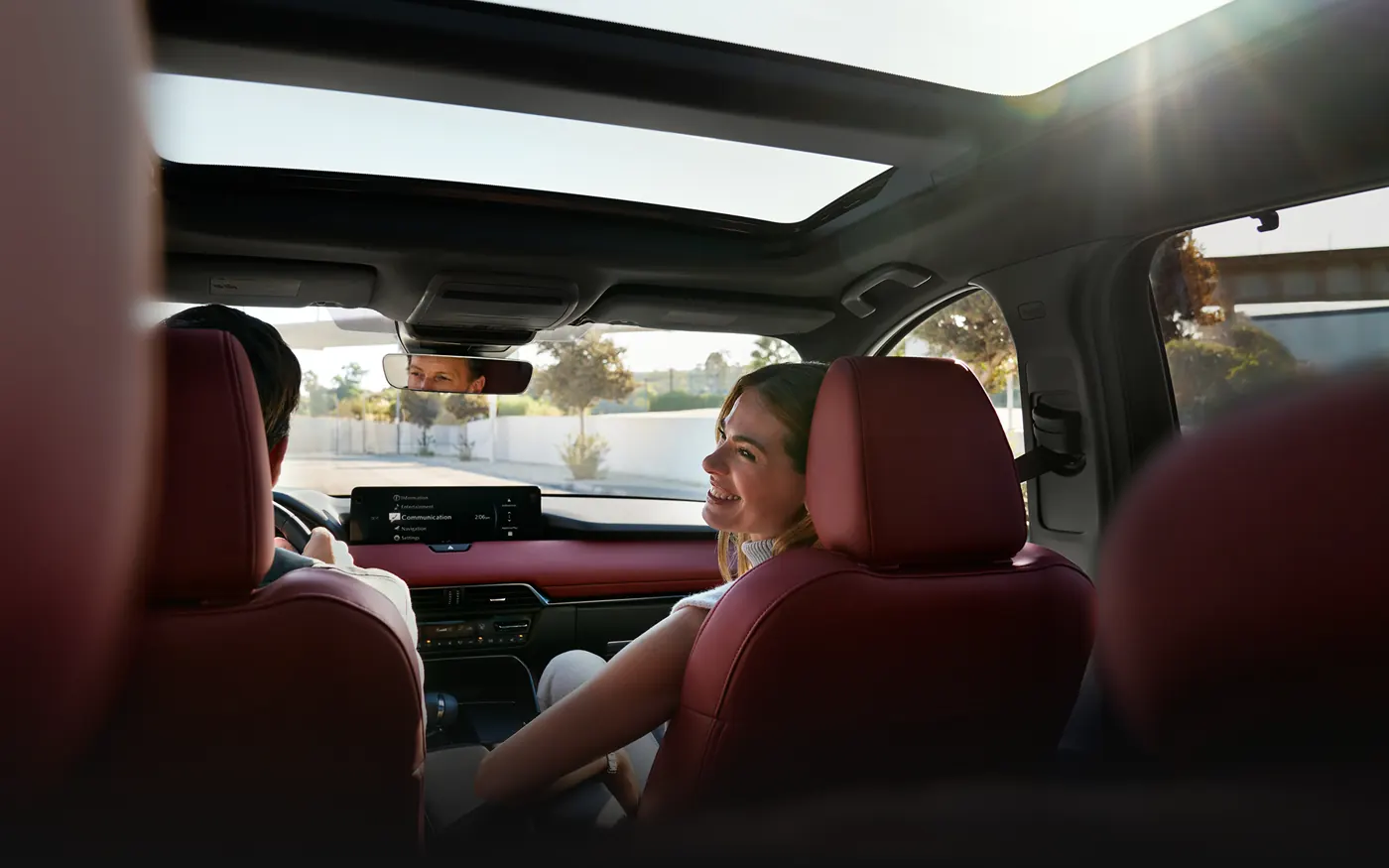 Friends riding in the 2-row 2027 Mazda CX-90 | Romano Mazda in Syracuse NY